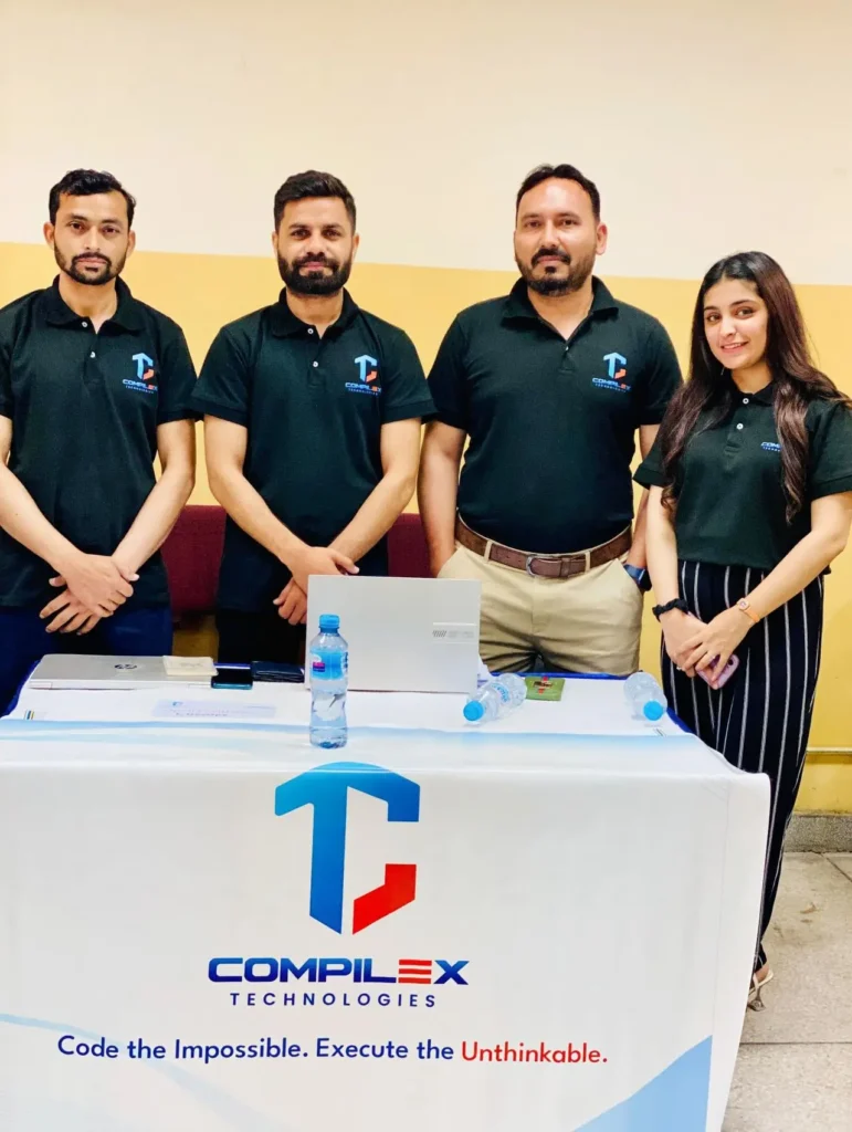 Team collaboration at Compilex Technologies, showcasing expertise in AI, Blockchain, and scalable software solutions